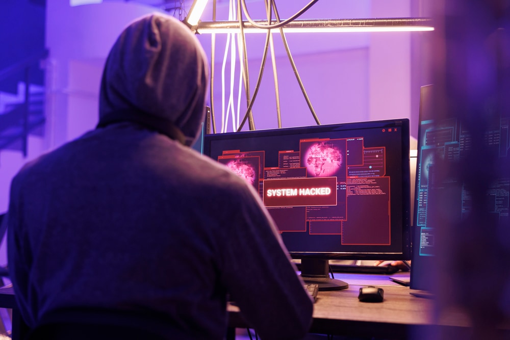 Cybercriminal attacking business' IT system