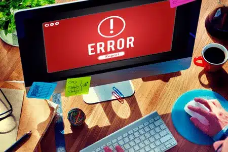 Computer monitor displaying critical system error message linked to potential server failure issues